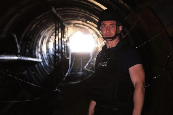 Murray walks through a Hamas tunnel in Gaza.