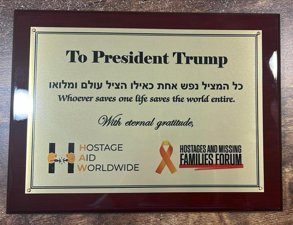 The plaque given by the freed hostages to Trump