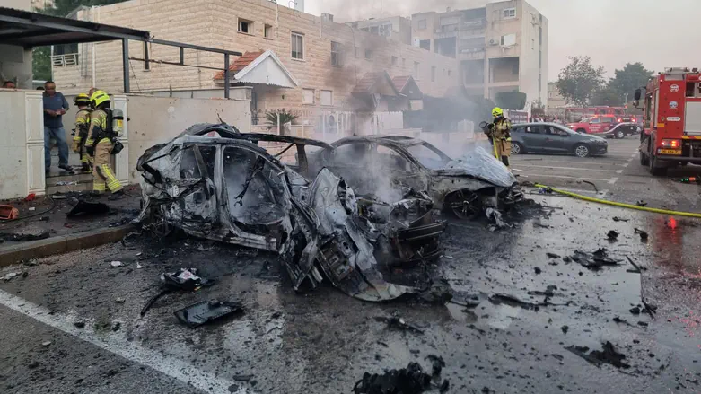 Watch: Cars in flames after being struck by rocket in Kiryat Yam