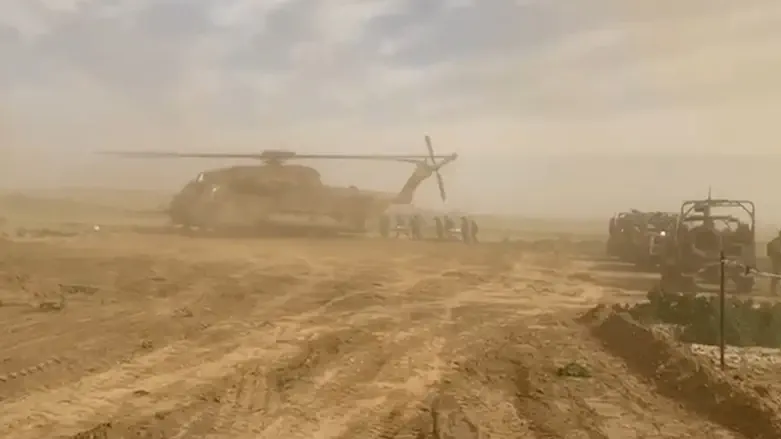 Under fire: Dramatic evacuation of injured soldier from battlefield