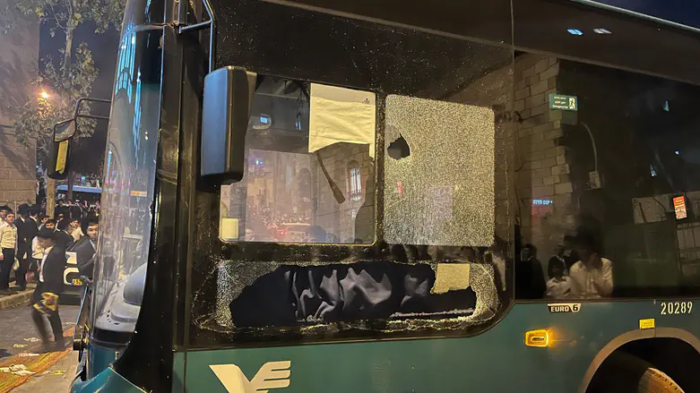 Bus with windows shattered during the riot