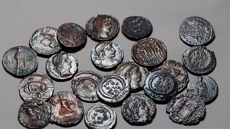 22 ancient copper coins found during excavations in the Galilee Credit: Emil Aladjem, Israel Antiquities Authority