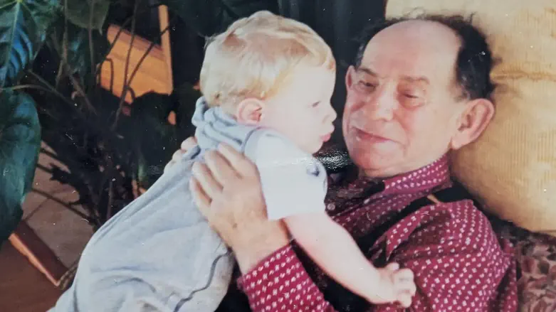Abraham Waserstein as a child with his grandfather, Szmul Wasersztein. Credit: Abraham Waserstein