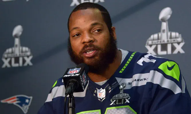 Michael Bennett of Seattle Seahawks withdraws from NFL trip to